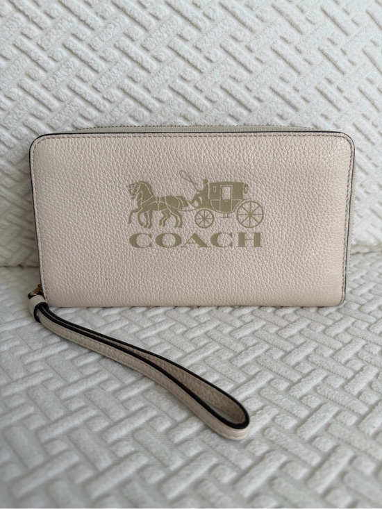 Coach Handbags - Coach Cream Pebbled Leather Zip Wallet Wristlet with Carriage Logo